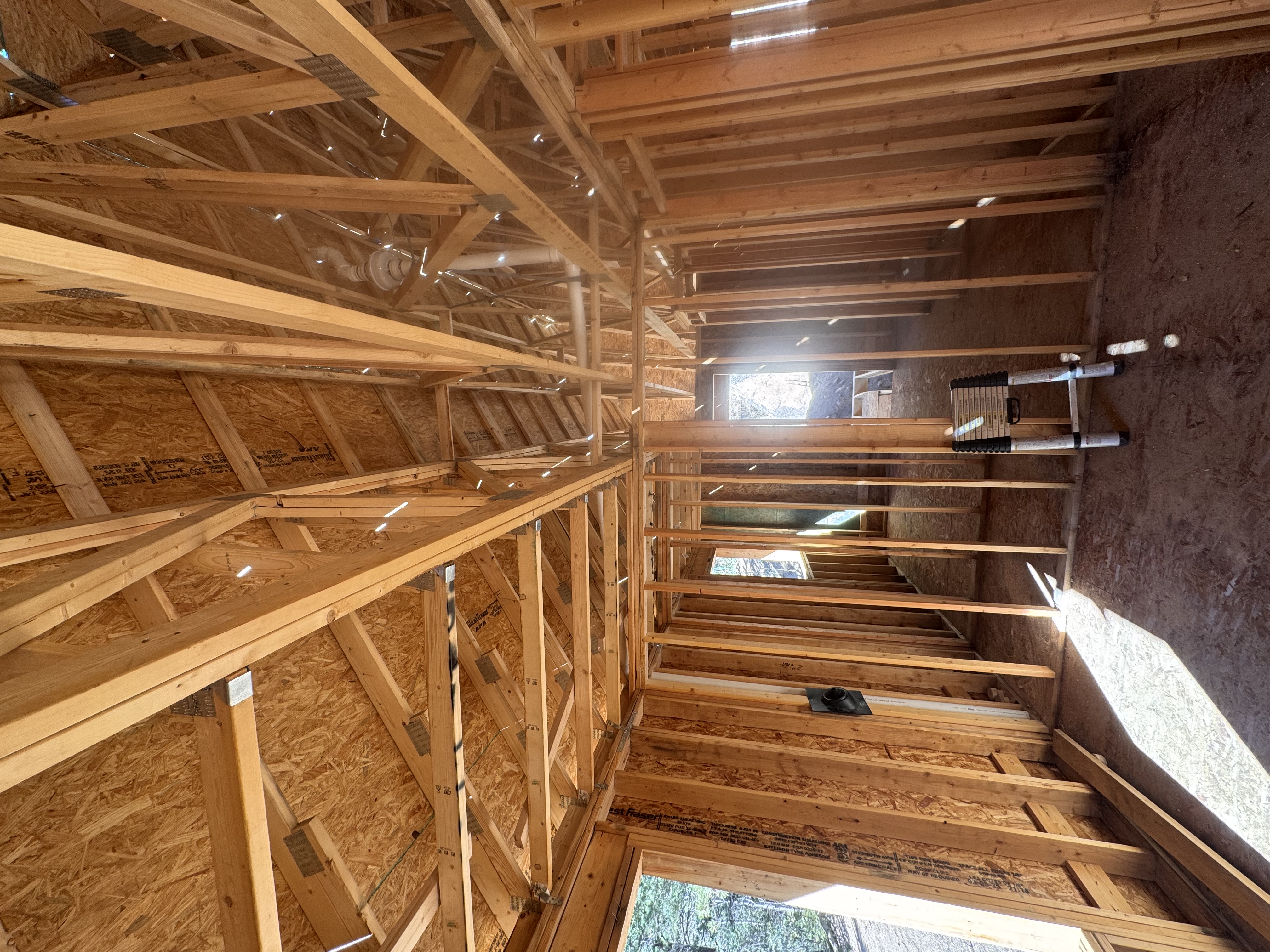 Sunlit new-construction home protected with a radon mitigation system
